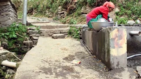 Climbing Himalayan village path tracking shot slow motion Stock Footage 58161481
