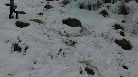 Climbing a ice waterfall Stock Footage 77952343