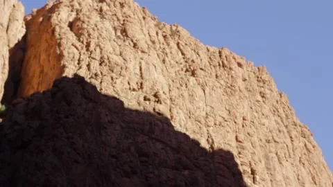 Climbing moroccan cliffs Stock Footage 134704253