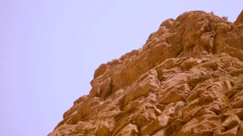 Climbing moroccan cliffs Stock Footage 134705058