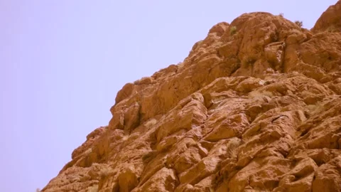 Climbing moroccan cliffs Stock Footage 134705220