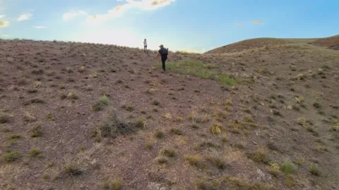 Climbing the mountain to the river Stock Footage 136755306