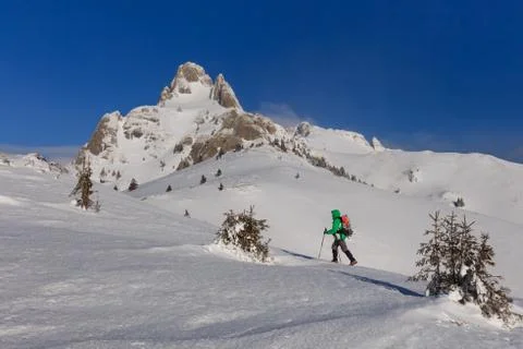 Climbing on mountain in winter Stock Photos