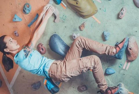 Climbing on practice wall Stock Photos