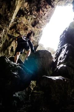 Climbing up Rocks Stock Photos