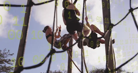 Climbing ropes, people with binary code overlay, focusing on teamwork and Stock Footage 303676260