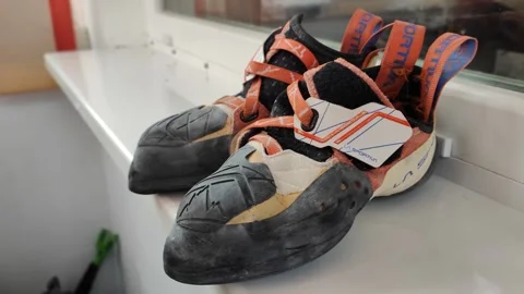 Climbing shoes Video stock 285732604