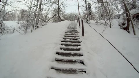Climbing the snow stairs Stock Footage 167435067