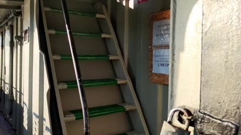 Climbing up the stairs at the ferry crossing Stock Footage 252460186