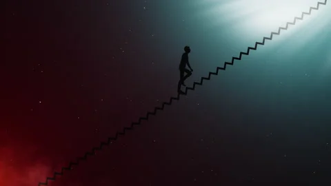 Climbing the stairs from hell to heaven Stock Footage 141439217