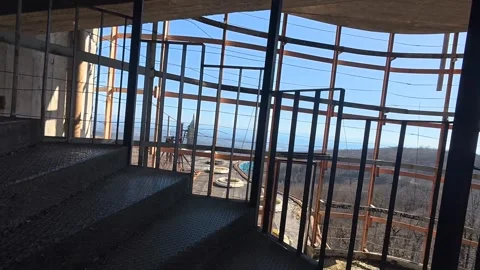 Climbing stairs inside the abandoned brutalist monument Petrova Gora Stock Footage 331236855