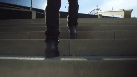 Climbing a stairs, low angle shot. Stock Footage 84892516