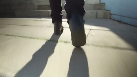 Climbing a stairs, low angle shot. Stock Footage 84893402