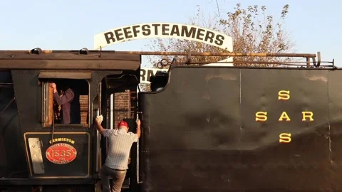 Climbing off a steam train Video stock 153657353