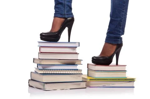 Climbing the steps of knowledge - education concept Stock Photos