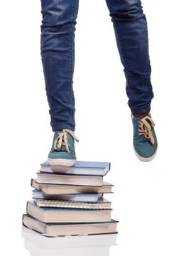 Climbing the steps of knowledge - education concept Stock Photos