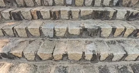 Climbing the stone steps in daylight - 0001.mp4 Stock Footage 341961947