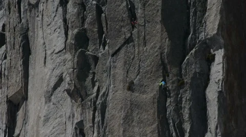 Climbing team on big alpine wall Chamonix Stock Footage 53576357