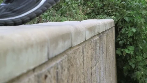 Climbing a wall Parkour style Stock Footage 76050133