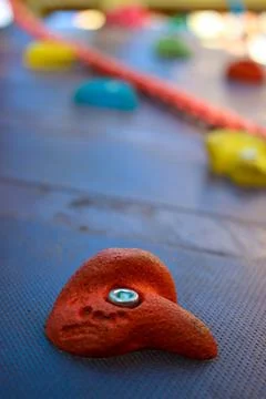 Climbing wall stone close up view. Sport and active lifestyle equipment. Park Stock Photos
