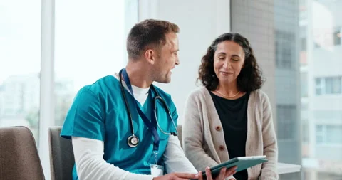 Clinic, high five and nurse with tablet, appointment and explaining good news to Stock Footage 341504599