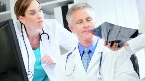 Clinical Colleagues Pleased X-Ray Results Stock Footage