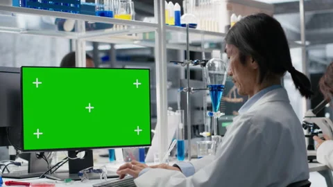 Clinical laboratory technologist using isolated screen computer Stock Footage 320723123
