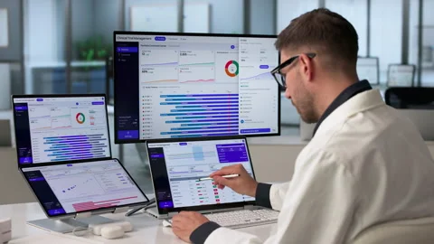 Clinical Trial Manager Analyzing Patient Enrollment Data Stock Footage 340397543