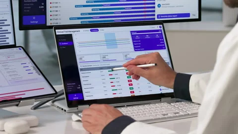 Clinical Trial Manager Analyzing Patient Enrollment Data Vídeo Stock 342963457