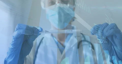 Clinician grabbing test cassette while health data graphs animating, aligning Stock Footage 314743337