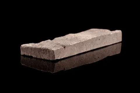 Clinker brick isolated on the black Stock Photos