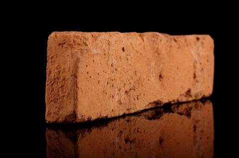Clinker brick isolated on the black Foto stock