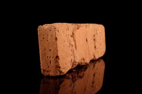 Clinker brick isolated on the black Foto stock