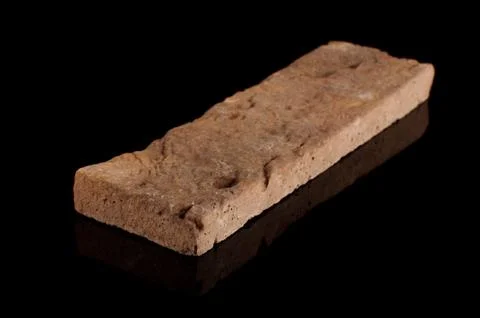 Clinker brick isolated on the black Stock Photos