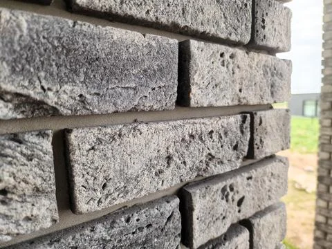 Clinker bricks on the house wall close up Stock Photos