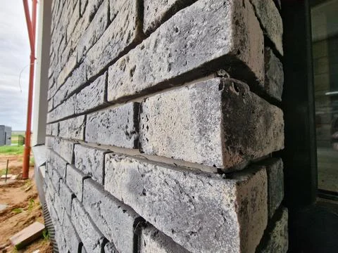 Clinker bricks on the house wall close up Stock Photos
