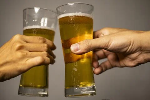 Clinking Beer Glasses Stock Photos