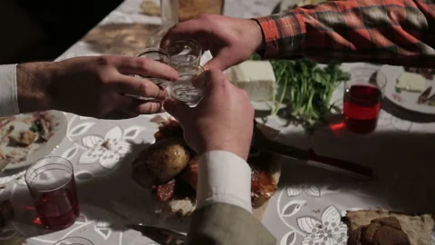 Clinking during a feast Video stock 147384967