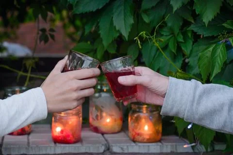 Clinking wine glasses Stock Photos