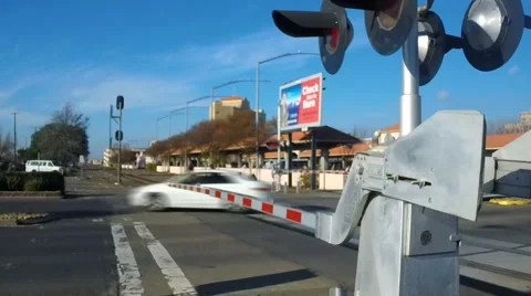 (Clip 2 of 4) Time-Lapse of dangerous drivers ignoring a railroad crossing Video stock 45432352