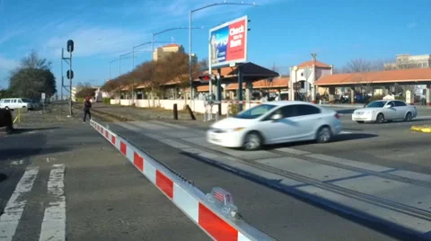 (Clip 3 of 4) Dangerous drivers ignore a railroad crossing warning Video stock 45432405