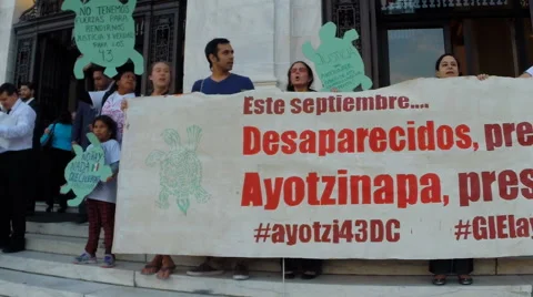 (Clip 3 of 4) Nightime protest for 43 missing students in Mexico  Stock Footage 55048559