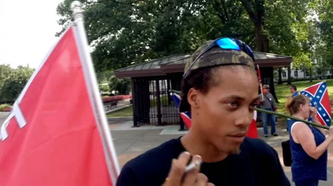 (Clip 9 of 13) Confederate flag supporters (BLACK MAN) Stock Footage 54398938