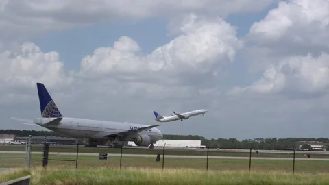 A clip of airliners taking off from a Houston Airport. Stock Footage 135304302