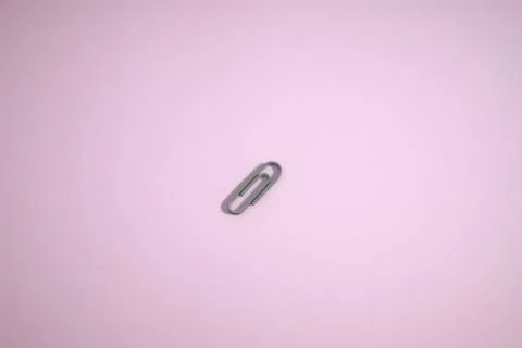 Clip icon in a pink background. 3D rendering. Stock Illustration