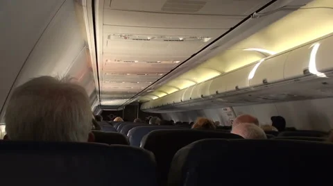 Clip inside passenger airliner during flight with passengers and stuardess 스톡 동영상 45581961