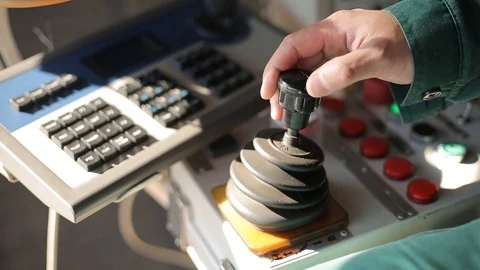 Clip pack of man hands control joysticks at grain terminal operator cabin Stock Footage 91191918