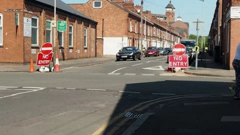 A clip of people crossing the intersection on Grasmere Street Leicester, UK. Stock Footage 242159700