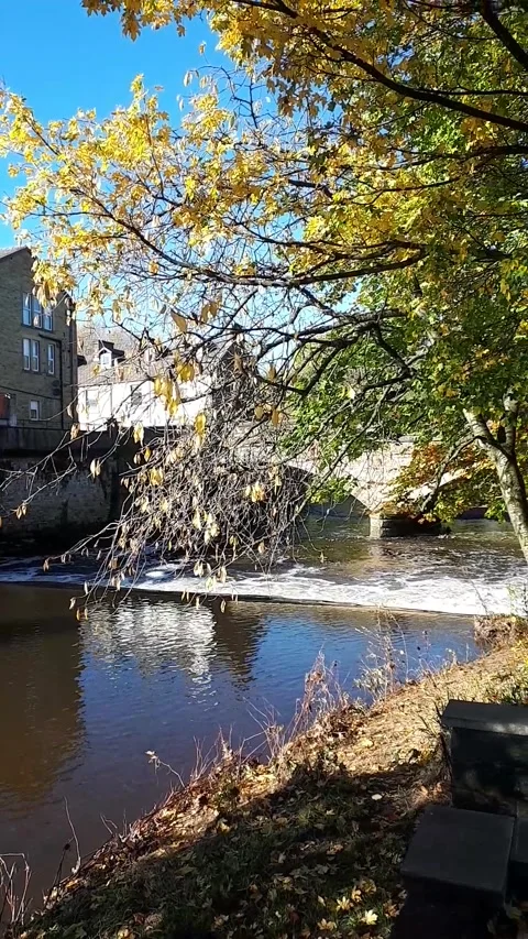 Clip of the powerful River Calder as it flows through Padiham Stock Footage 164601607