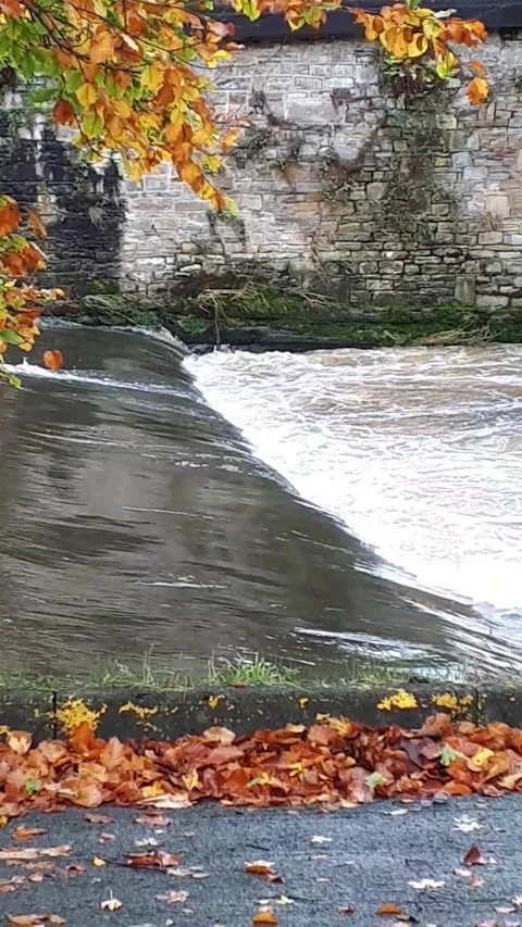 Clip of the powerful River Calder as it flows through Padiham Stock Footage 164846745